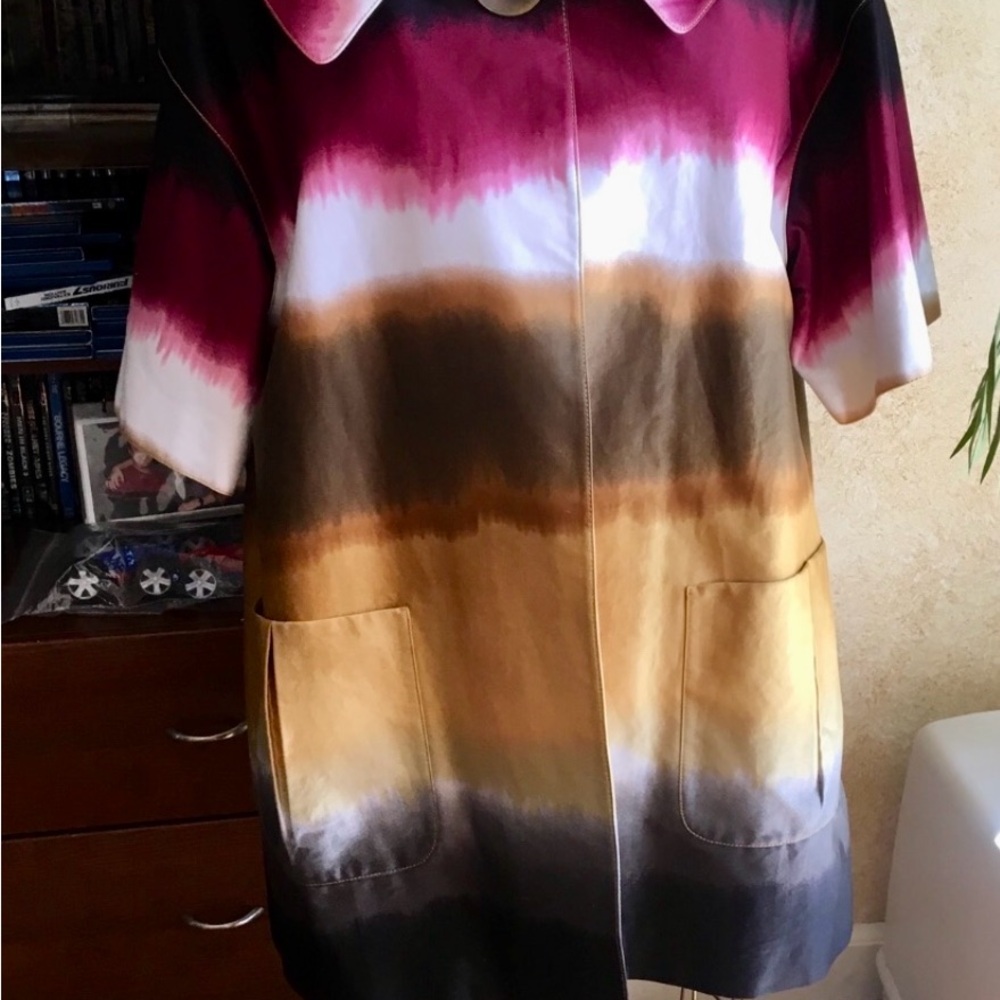 Multi color jacket, lined. 3/4 L shaped. Sleeves 3/4